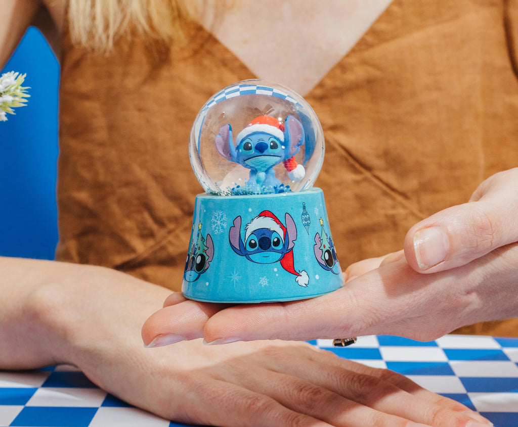Disney Lilo & Stitch Santa Stitch 3-Inch Mini Light-Up Snow Globe